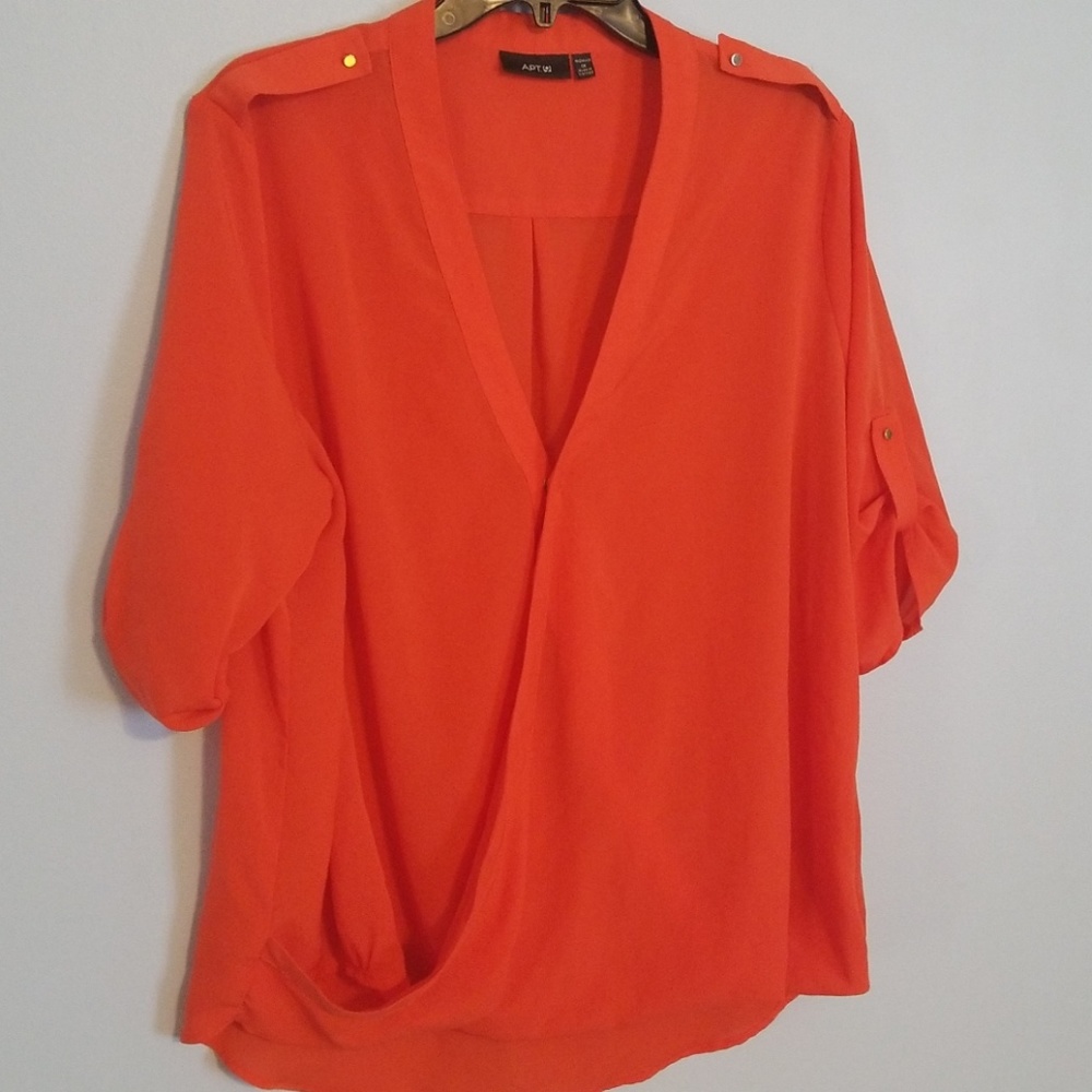 Orange blouse.